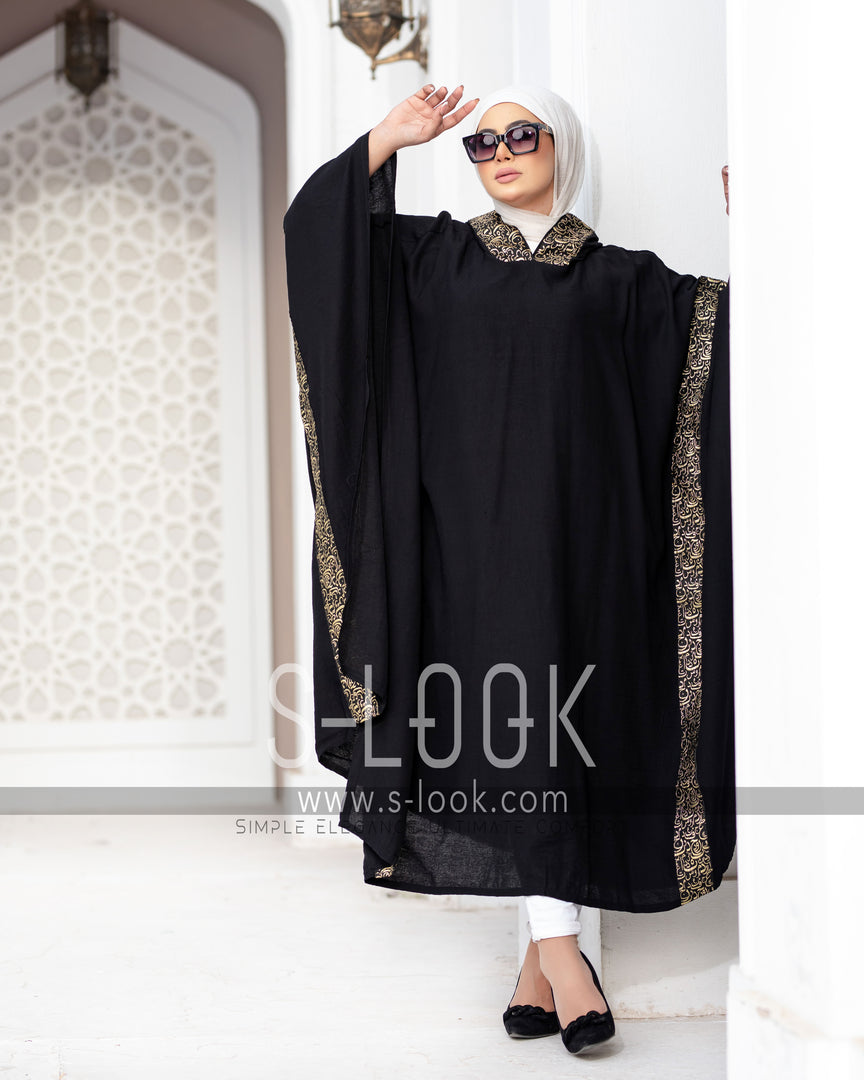 Poncho with Arabic calligraphy