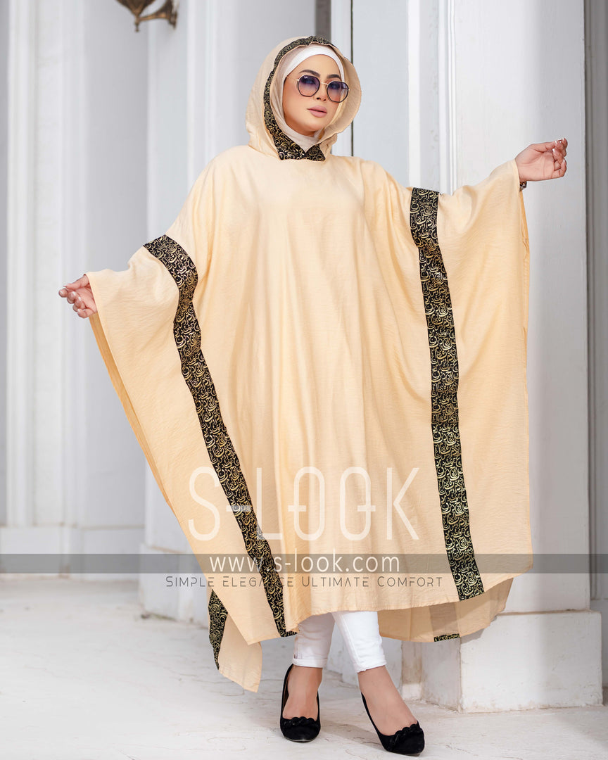 Poncho with Arabic calligraphy