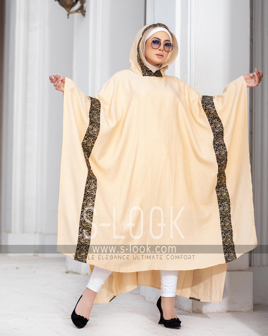 Poncho with Arabic calligraphy